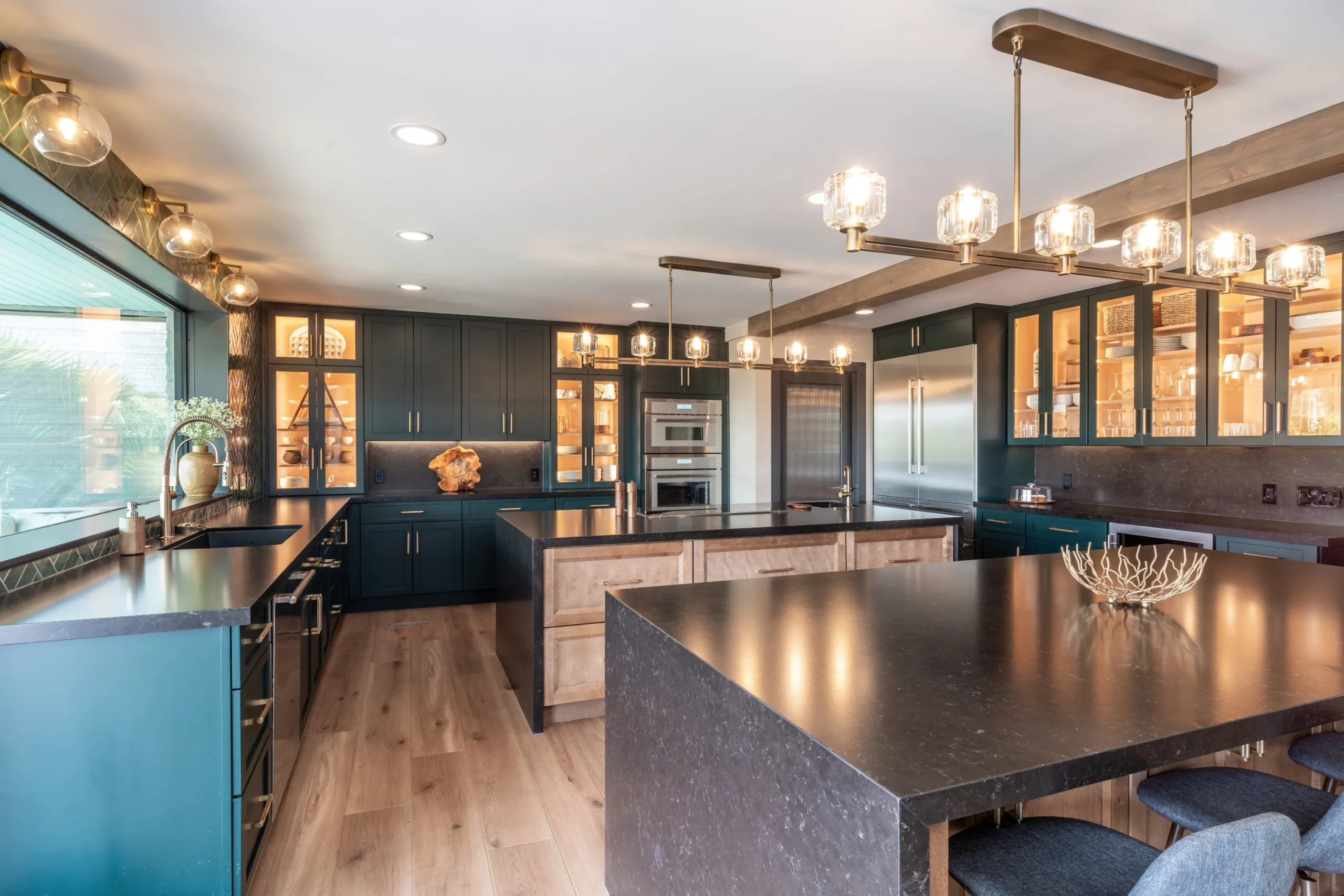 deep green double island kitchen overview